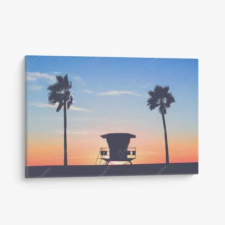 Tableau sur toile coucher de soleil sur la plage avec cabine de sauveteur – Wallnifity®