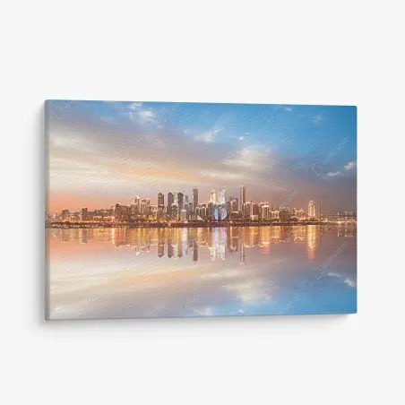 Tableau sur toile panorama urbain au coucher du soleil – Wallnifity®