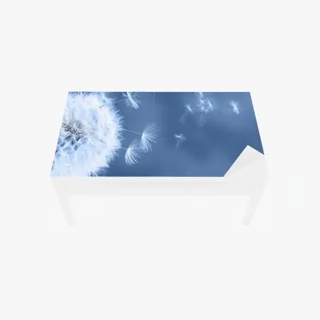 Sticker pour table et bureau pissenlit en suspension sur fond bleu – Wallnifity®