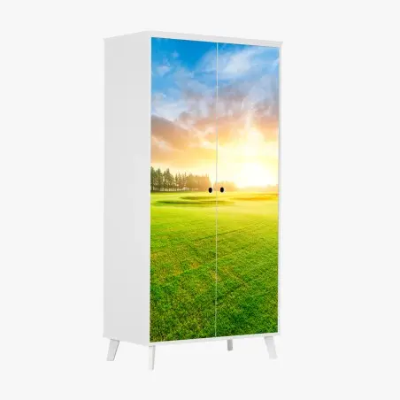 Sticker pour armoire coucher de soleil doré sur le gazon et la forêt – Wallnifity®