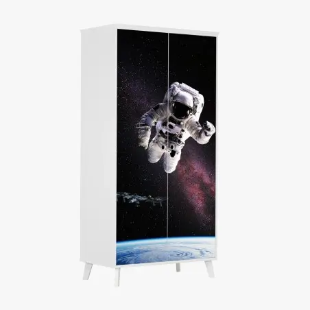 Sticker pour armoire astronaute en apesanteur au-dessus de la Terre – Wallnifity®
