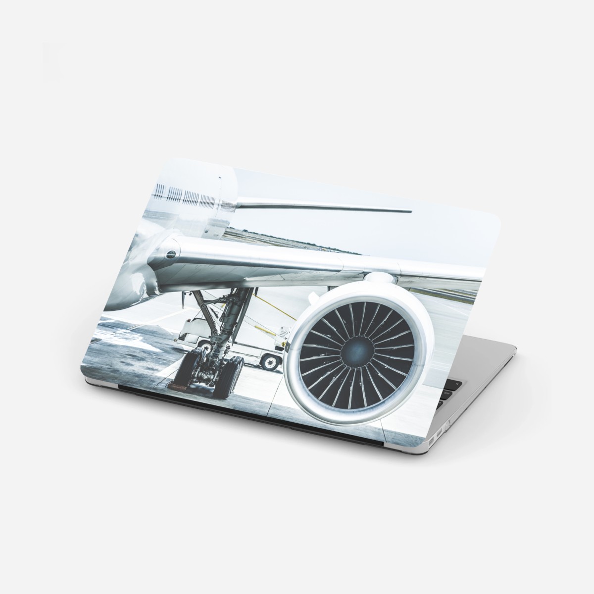 Sticker pour ordinateur portable détail moteur d'avion au terminal – Wallnifity®