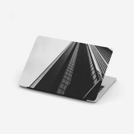 Sticker pour ordinateur portable perspective monumentale d'un gratte-ciel en noir et blanc – Wallnifity®