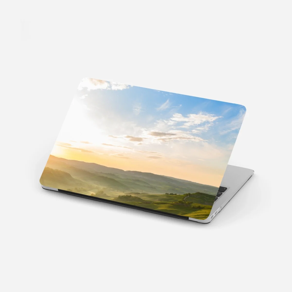 Sticker pour ordinateur portable aurore dorée sur collines verdoyantes – Wallnifity® Sticker pour ordinateur portable aurore dorée sur collines verdoyantes – Wallnifity®