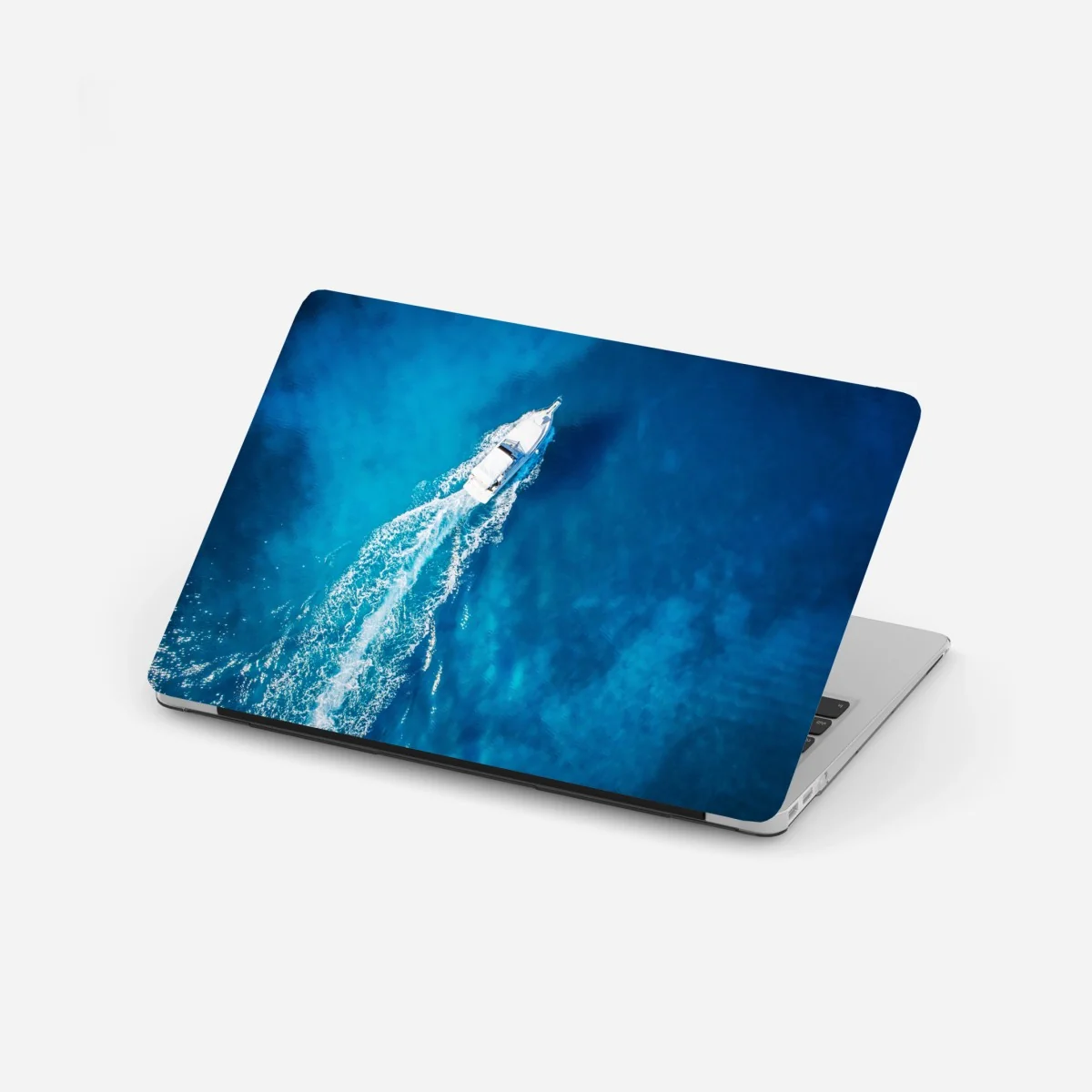 Sticker pour ordinateur portable évasion en yacht sur eaux turquoises – Wallnifity® Sticker pour ordinateur portable évasion en yacht sur eaux turquoises – Wallnifity®