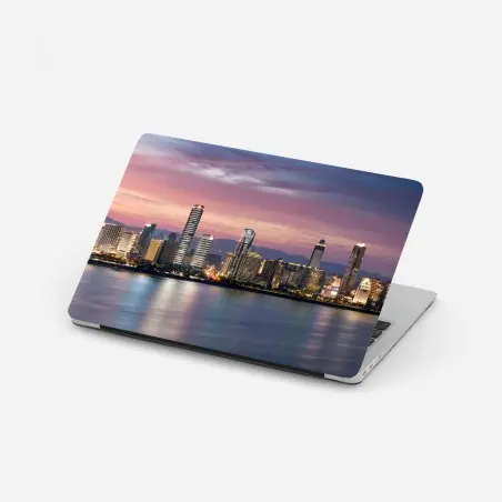 Sticker pour ordinateur portable coucher de soleil sur la ligne d'horizon urbaine – Wallnifity®