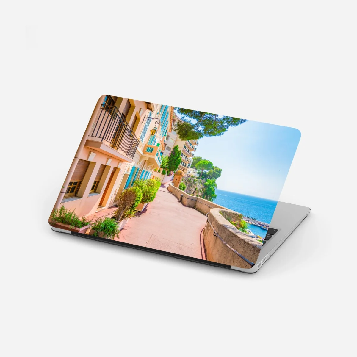 Sticker pour ordinateur portable balade côtière aux façades pastel – Wallnifity® Sticker pour ordinateur portable balade côtière aux façades pastel – Wallnifity®