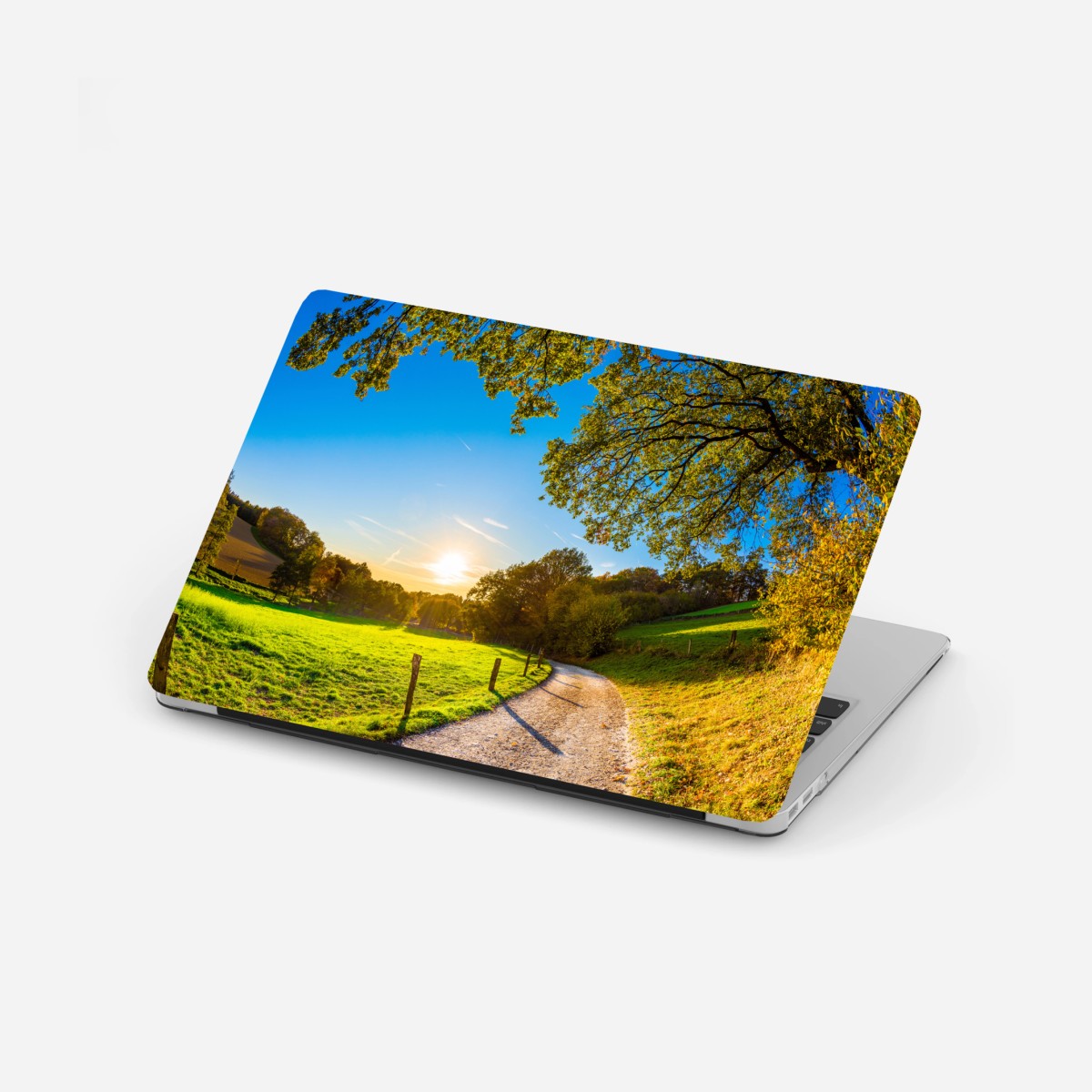 Sticker pour ordinateur portable chemin ensoleillé au coucher du soleil – Wallnifity®
