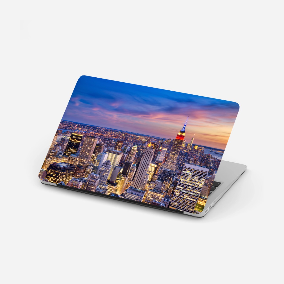 Sticker pour ordinateur portable crépuscule sur New York — Empire State Building illuminé – Wallnifity®