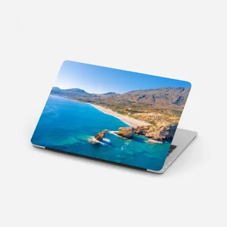 Sticker pour ordinateur portable paysage côtier aux eaux turquoises et falaises sculptées – Wallnifity®