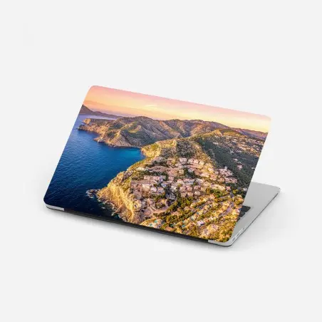Sticker pour ordinateur portable villages perchés sur falaises au crépuscule – Wallnifity®