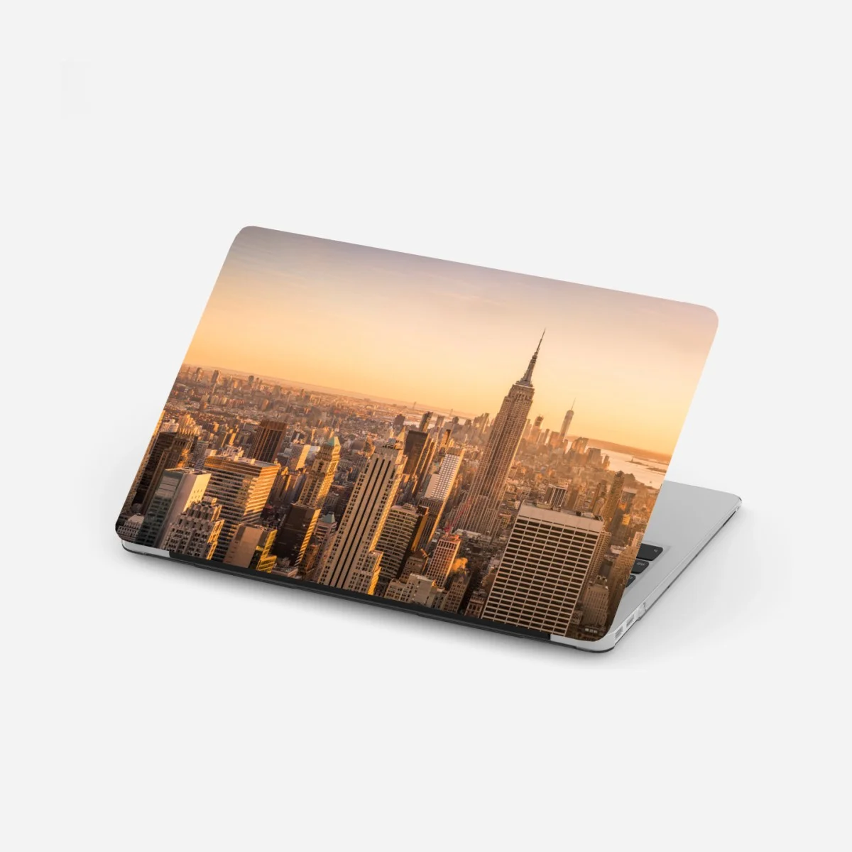 Sticker pour ordinateur portable panorama doré de New York au coucher du soleil – Wallnifity® Sticker pour ordinateur portable panorama doré de New York au coucher du soleil – Wallnifity®