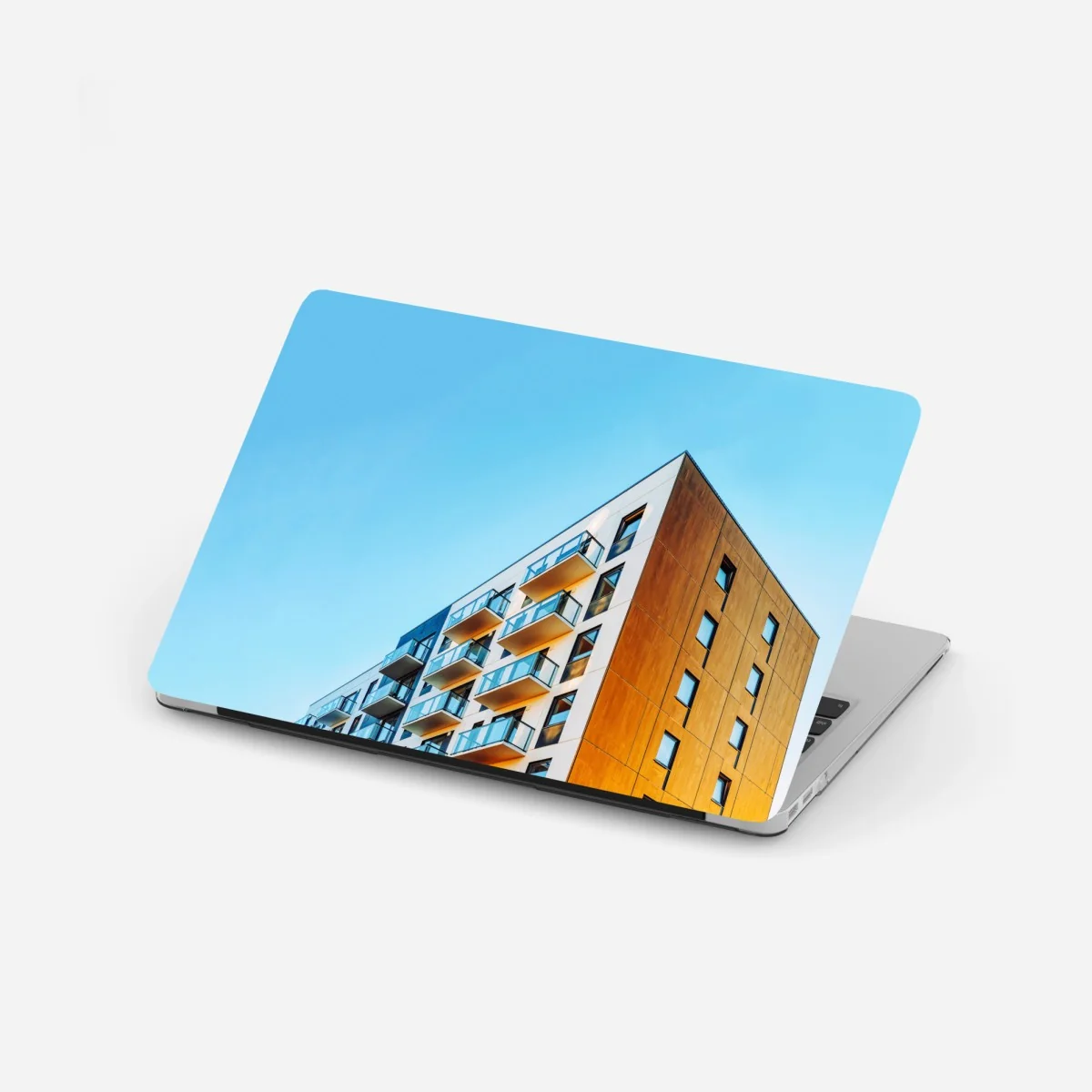 Sticker pour ordinateur portable balcons contemporains contre un ciel bleu – Wallnifity® Sticker pour ordinateur portable balcons contemporains contre un ciel bleu – Wallnifity®