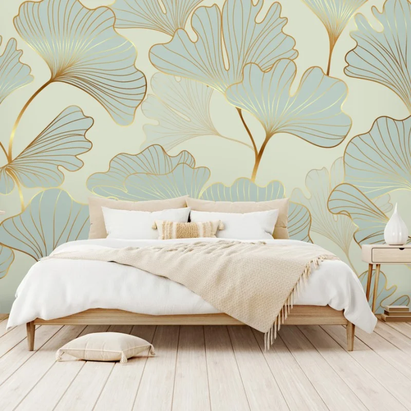 Papier peint motif feuilles de ginkgo dorées sur fond pastel