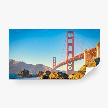 Papier peint pont emblématique de San Francisco baigné de lumière dorée – Wallnifity®