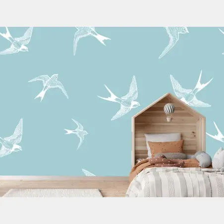 Papier peint motif d'hirondelles en vol sur fond bleu pastel – Wallnifity®