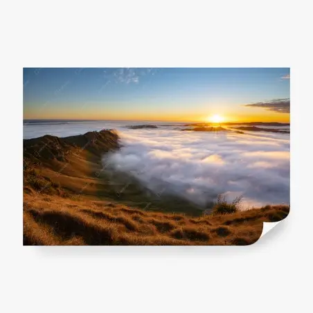 Papier peint aube dorée au-dessus d'une mer de nuages – Wallnifity®