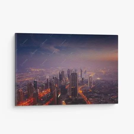 Tableau sur toile panorama urbain illuminé au crépuscule – Wallnifity®