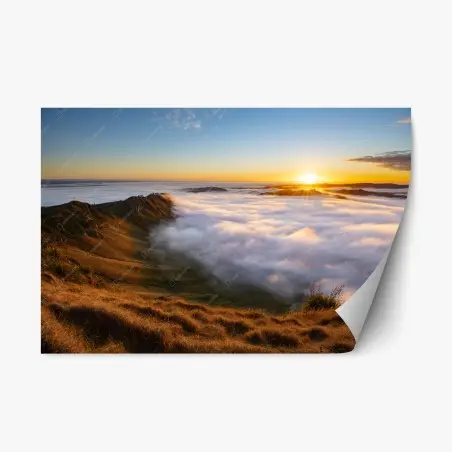 Sticker repositionnable aube dorée au-dessus d'une mer de nuages – Wallnifity®