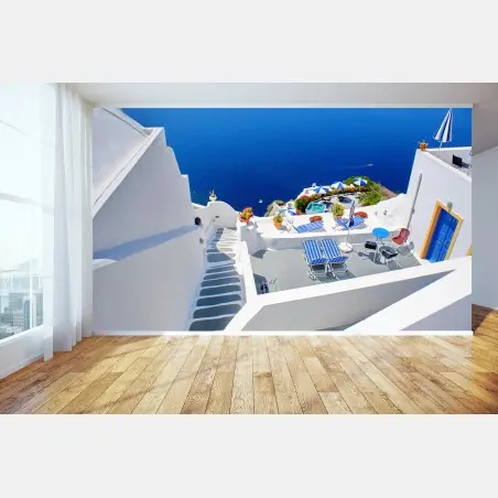 Papier peint terrasse blanche surplombant la mer à Santorin – Wallnifity®