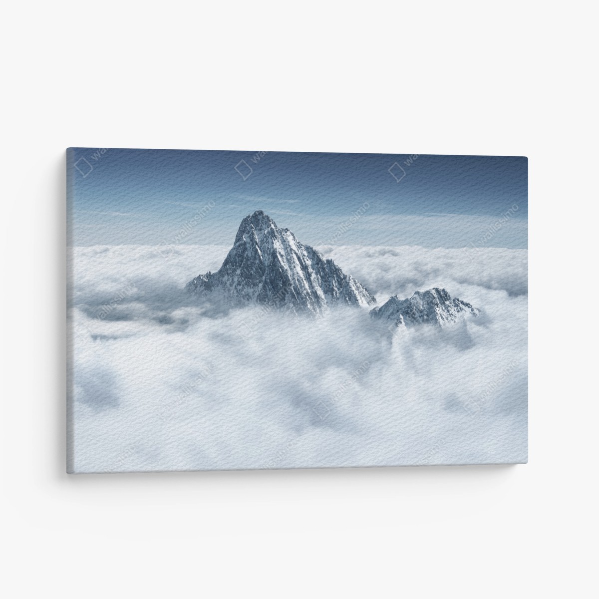 Tableau sur toile sommet enneigé émergeant d'une mer de nuages – Wallnifity®